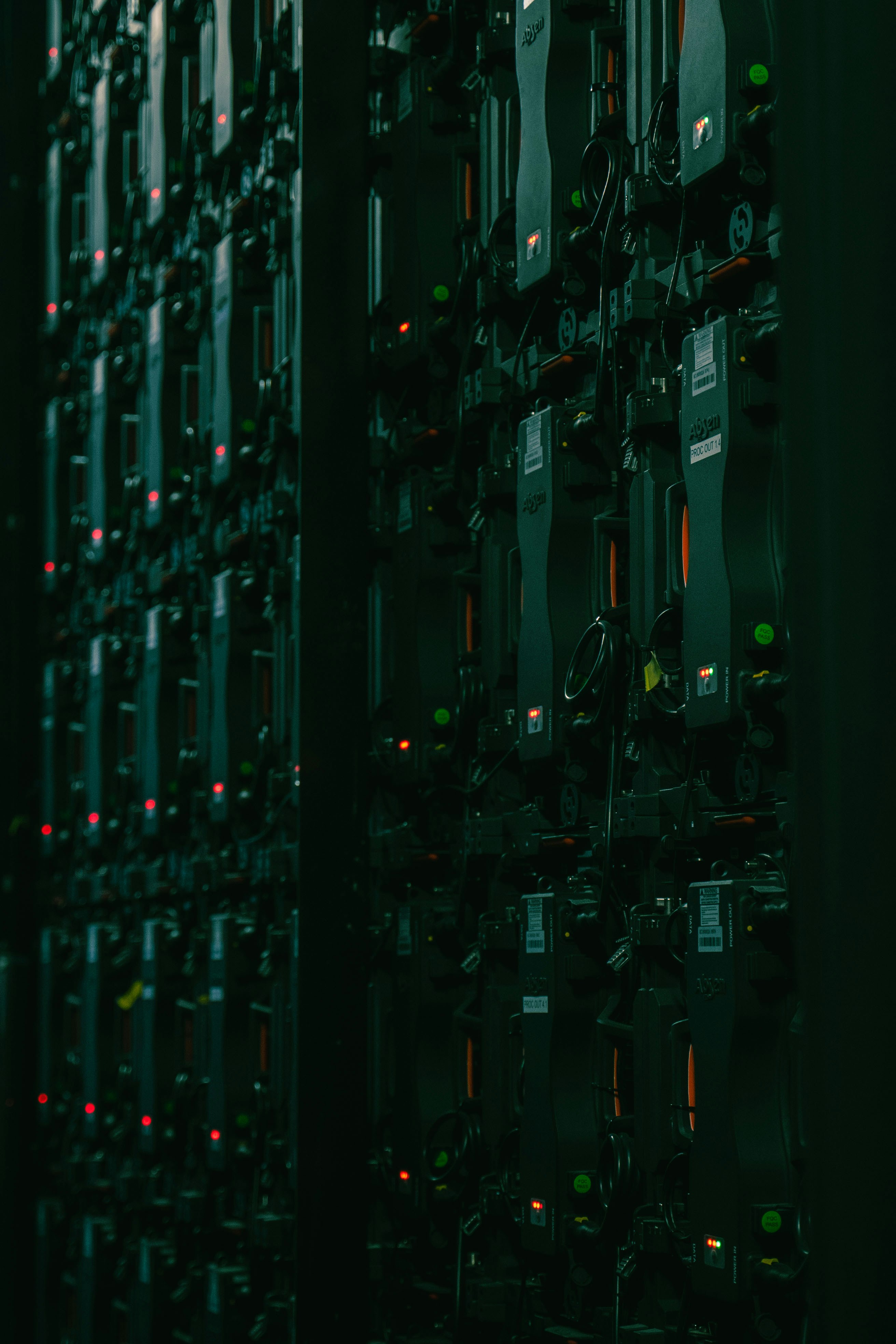 Server racks in a data center with glowing lights